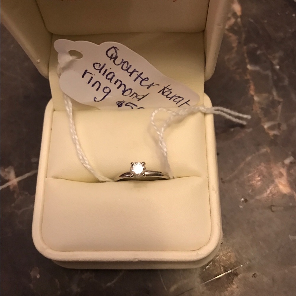 White gold quarter karat diamond ring